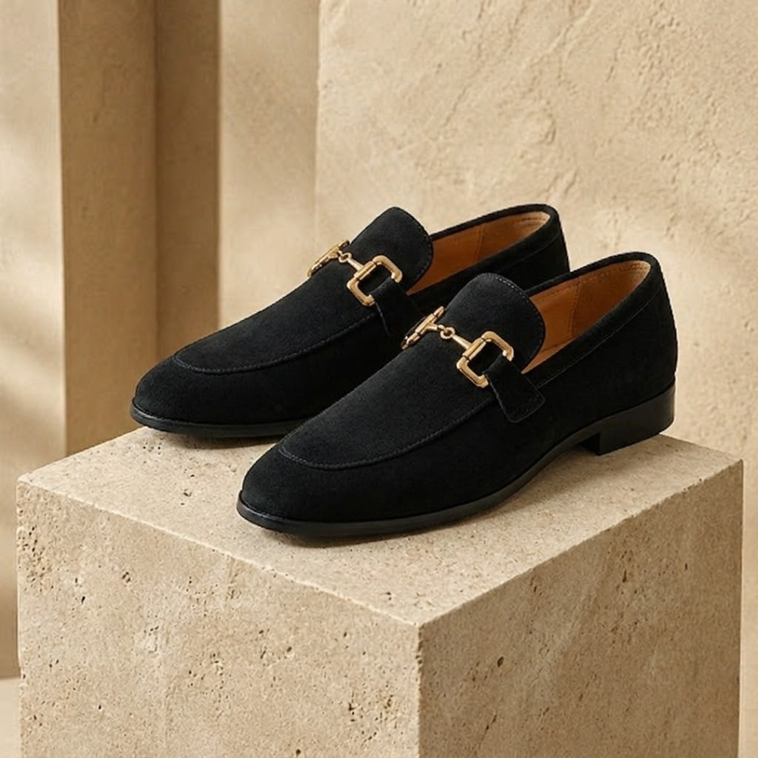 Men's brown suede slip-on loafers by FJØRNA, showcasing smooth suede material and classic loafer design.