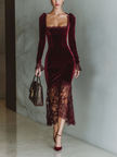 FJØRNA burgundy velvet maxi dress showing elegant flowy design and long sleeves for evening wear.