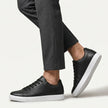 Men's FJØRNA leather lace-up low top sneakers with sleek design and white soles, showcasing stylish men's shoes.