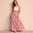 FJØRNA pink paisley shirred high-waist boho maxi skirt in white, flowing fabric with a relaxed, stylish fit for women.