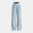 Women's FJØRNA criss-cross waist wide-leg trousers, loose pull-on pants with relaxed fit and stylish design, shown on model.