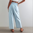 FJØRNA women's wide-leg denim trousers with a relaxed fit, showcasing the stylish, high-waisted design and classic blue denim fabric.