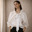 FJØRNA women's oversized gingham ruffle long sleeve blouse, stylish and flowy top with ruffled details and a relaxed fit.
