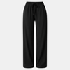 FJØRNA women's wide-leg drawstring lounge trousers with a loose fit and pull-on design, shown in a relaxed, comfortable style.
