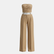 FJØRNA pinstripe strapless wide-leg jumpsuit for women, perfect as a stylish wedding guest outfit, featuring a modern set design.