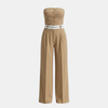 FJØRNA pinstripe strapless wide-leg jumpsuit for women, perfect as a stylish wedding guest outfit, featuring a modern set design.