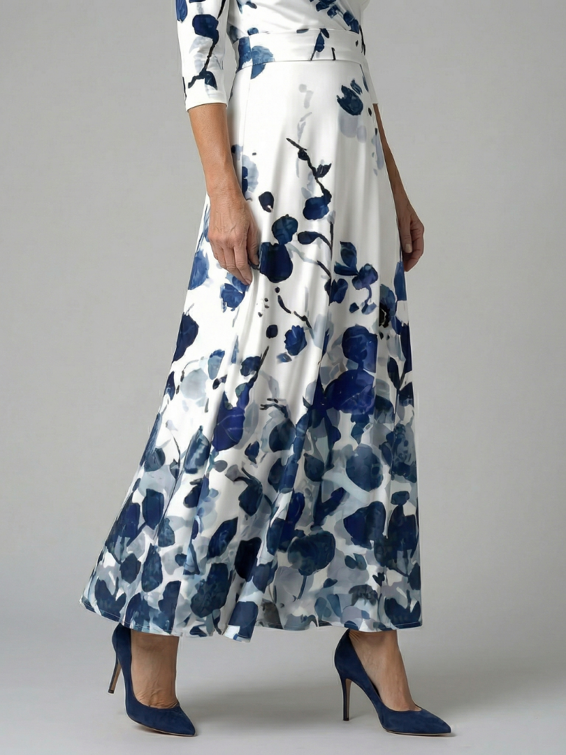 FJØRNA women's floral summer maxi dress with long sleeves, wrap style, flowy fabric, perfect for warm weather and outdoor events.