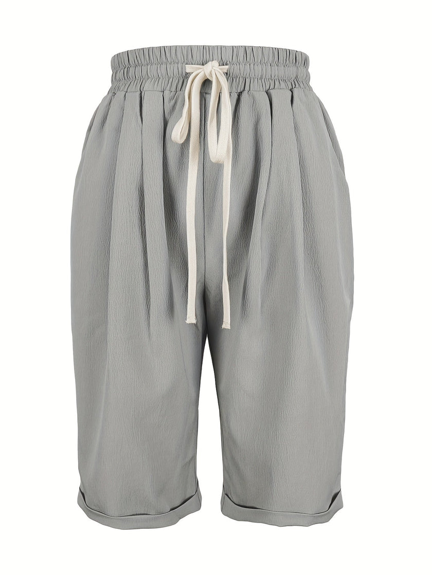 FJØRNA women's lightweight summer capri pants with drawstring elastic waist, casual trousers for warm weather.