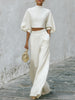 Cream textured lantern sleeve two-piece set for women featuring stylish pants from FJØRNA, shown on a model.