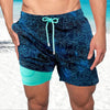Men's FJØRNA secure fit swim shorts for the beach, featuring a lightweight, quick-dry fabric with a stylish design.