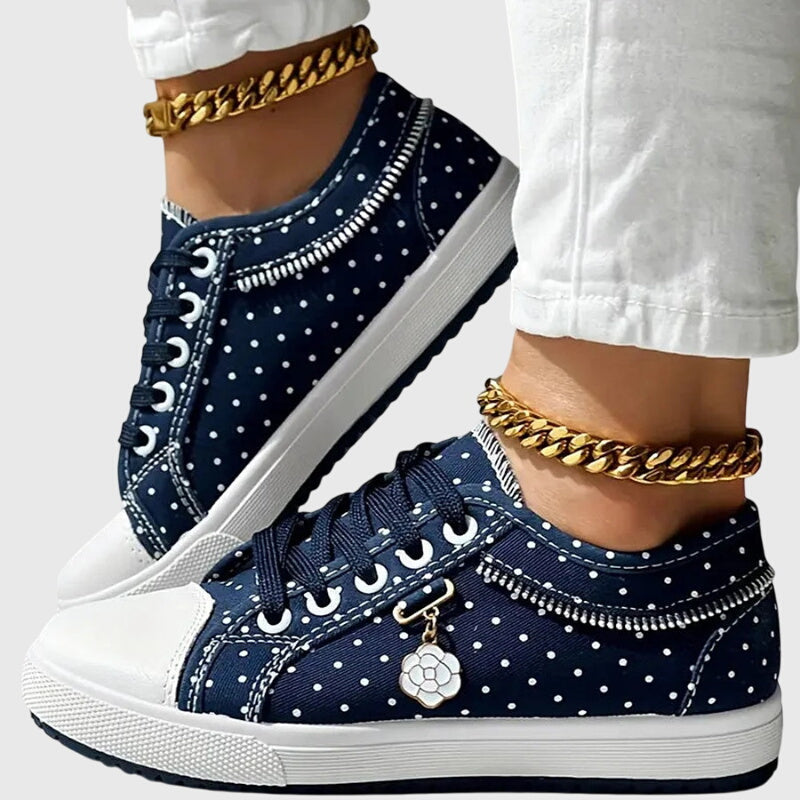 FJØRNA women's orthopedic sneakers with breathable mesh upper and cushioned insoles, designed for comfort and support.