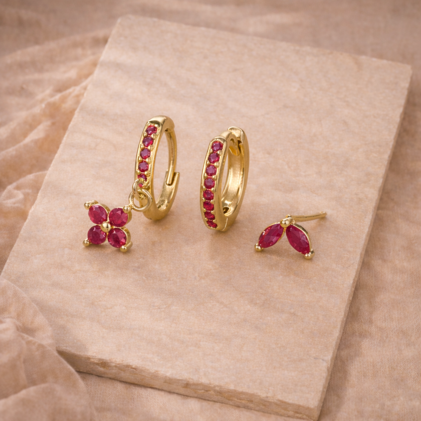 Unisex FJØRNA minimalist piercing set with stainless steel hoops and studs, featuring simple, modern jewelry accessories for women.