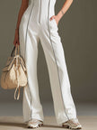 White cotton blend short sleeve wide-leg jumpsuit for women by FJØRNA, featuring a comfortable fit and stylish design.