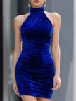 Royal blue velvet halter bodycon mini dress by FJØRNA, stylish cocktail dress with a fitted silhouette and elegant halter neckline.