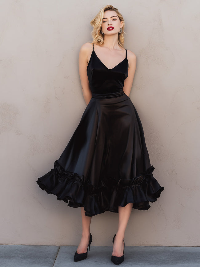 FJØRNA satin ruffled midi dress with spaghetti straps, featuring a flowy, elegant design and delicate ruffle details.