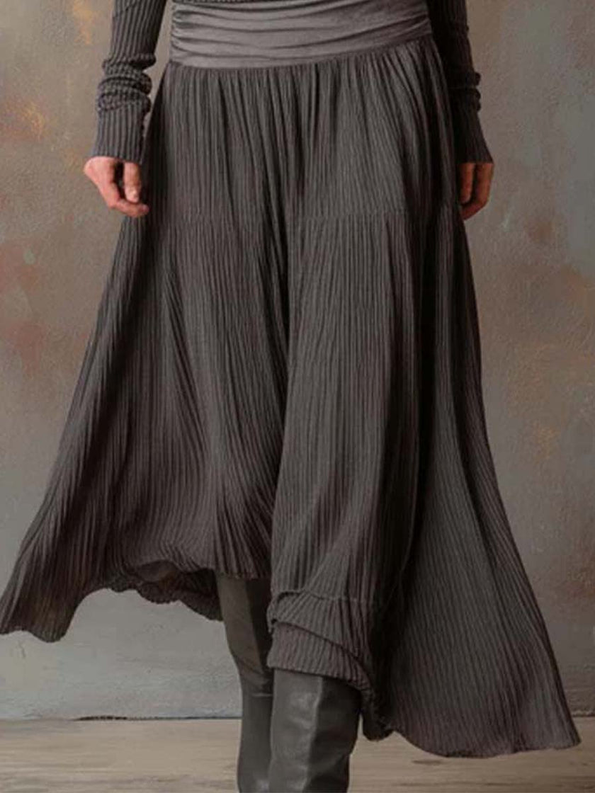 FJØRNA charcoal knit maxi dress for women, featuring a flowing silhouette and long sleeves, perfect for casual or elegant wear.