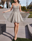 Mint green tulle cocktail dress for women by FJØRNA, featuring a flowing skirt and elegant design suitable for special occasions.