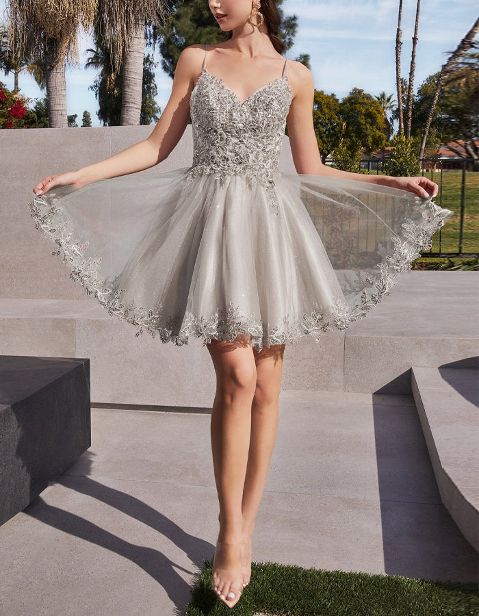 Mint green tulle cocktail dress for women by FJØRNA, featuring a flowing skirt and elegant design suitable for special occasions.
