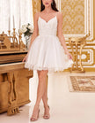 Mint green tulle cocktail dress for women by FJØRNA, showing a flowing, elegant dress with detailed tulle fabric and fitted silhouette.