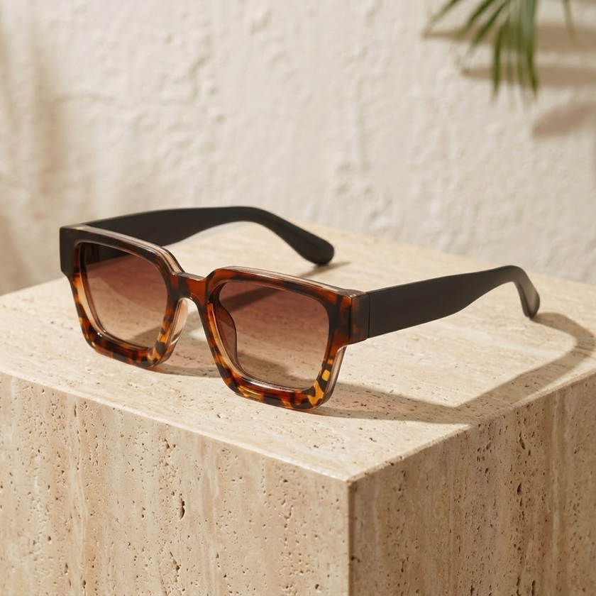 Vintage 90s FJØRNA rectangular unisex sunglasses with dark lenses and thick frame, retro accessory for women and men.