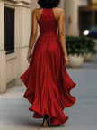 FJØRNA navy satin halter ruffle gown, elegant black tie dress with flowing ruffle details and a sleek halter neckline.