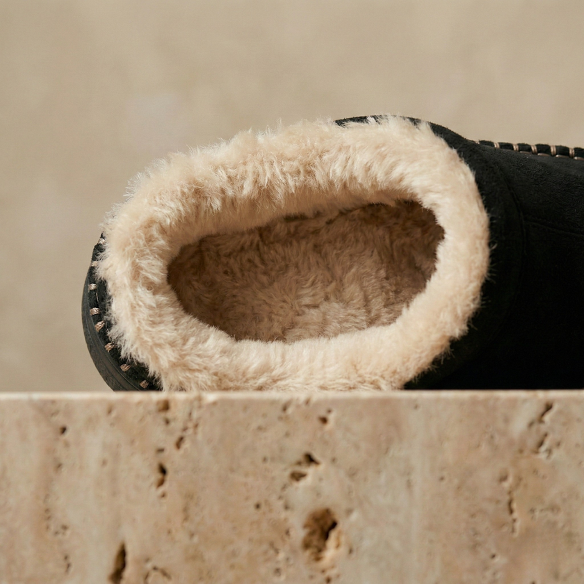 Men's soft slip-on slippers by FJØRNA, cozy house shoes with plush fabric and easy slip-on design for comfortable indoor wear.