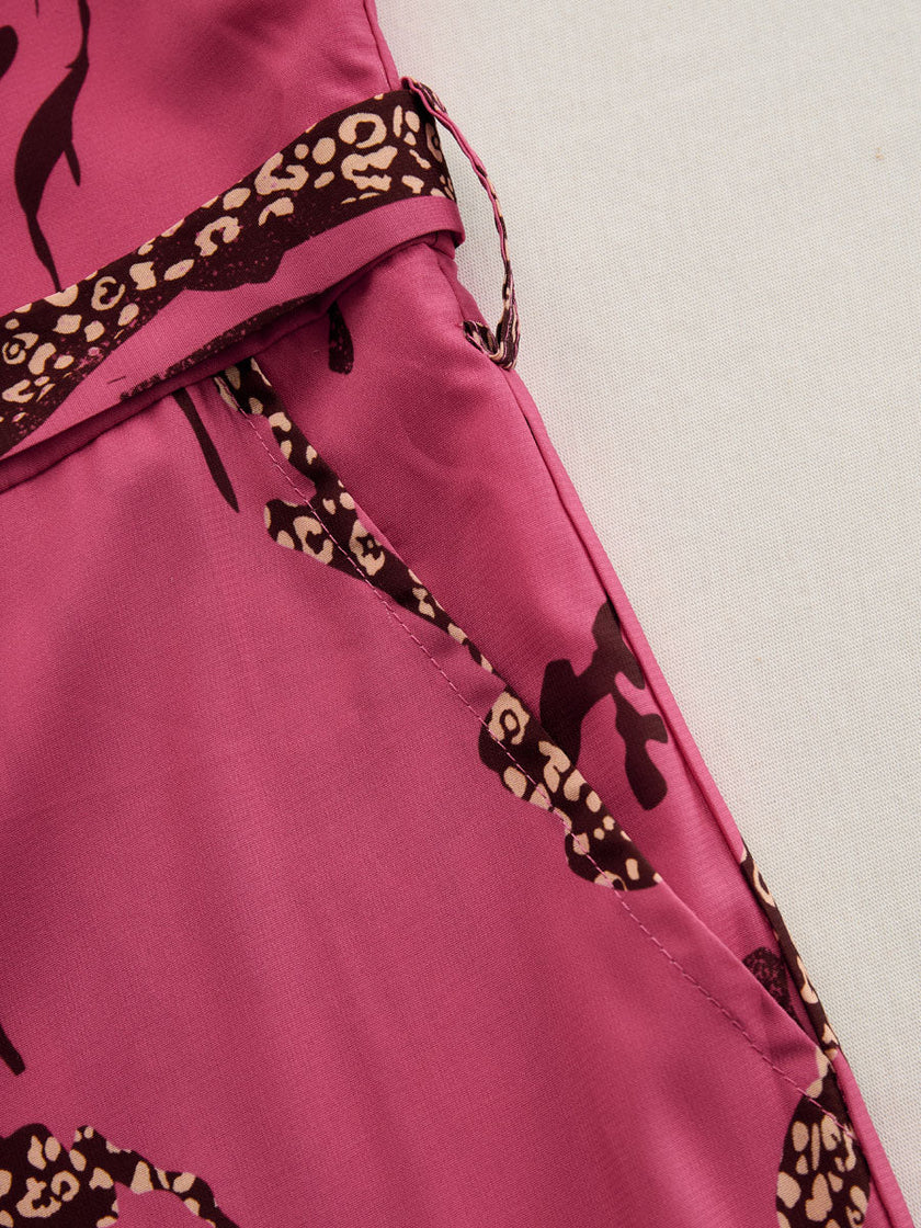 FJØRNA rose red leopard print chiffon long sleeve jumpsuit with pants for women, featuring a flowing fabric and stylish pattern.