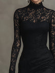 Black lace fishtail maxi dress by FJØRNA featuring intricate lace details and a fitted silhouette for elegant evening wear.
