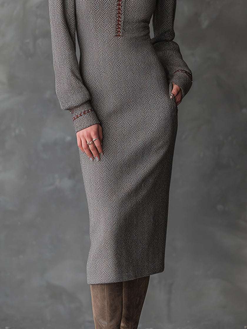 FJØRNA Ash Taupe Herringbone Knit Midi Dress, bohemian style, featuring a fitted bodice and flowing skirt in a taupe herringbone pattern.
