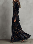 FJØRNA velvet floral midnight evening dress with long sleeves and elegant floral pattern, suitable for formal occasions.