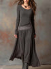 FJØRNA charcoal knit maxi dress for women, featuring a flowing silhouette and long sleeves, perfect for casual or elegant occasions.