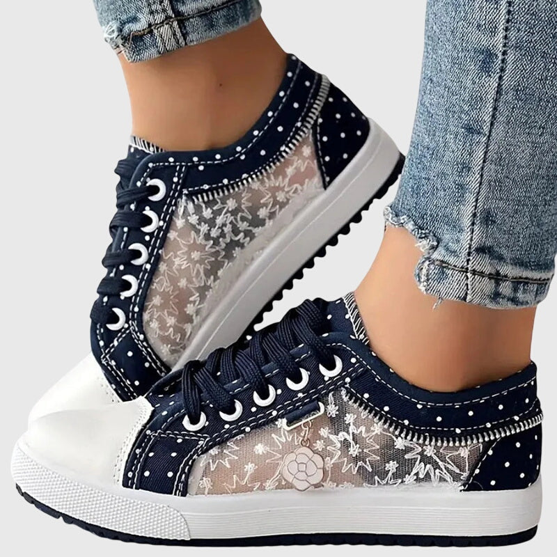 FJØRNA women's orthopedic sneakers with breathable mesh upper and cushioned insoles for comfort and support.
