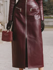 FJØRNA burgundy leather zip-front midi coat dress showcasing edgy sophistication with sleek design and structured silhouette.
