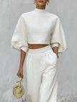 Cream textured lantern sleeve two-piece set with pants for women by FJØRNA, shown on a model.