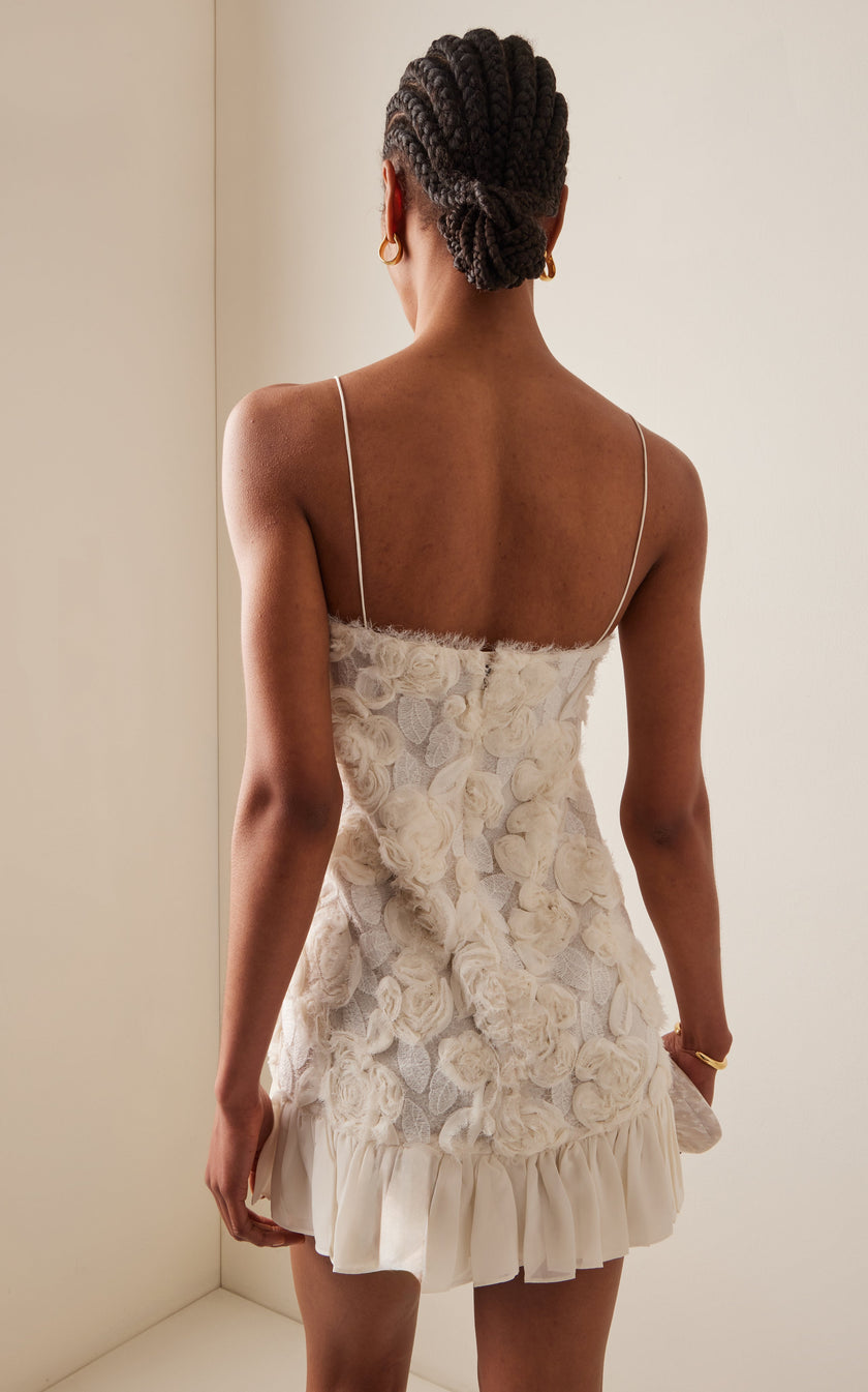 White Rosette Georgette Frilled Mini Dress by FJØRNA, elegant wedding guest dress with ruffles and floral rosette details.