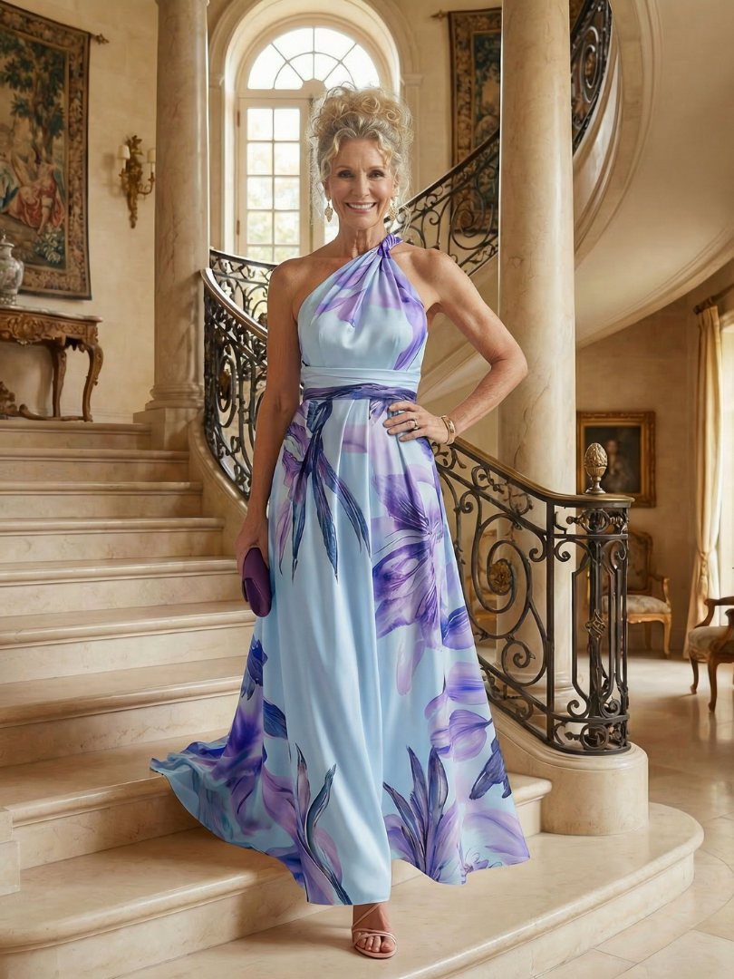 FJØRNA women's summer maxi dress with floral print, halter neck, sleeveless design, perfect for warm weather.