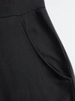 FJØRNA women's black striped sleeveless hooded jumpsuit with pants, featuring a relaxed fit and casual style.