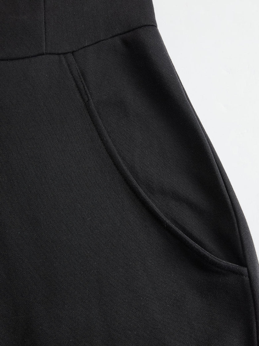 FJØRNA women's black striped sleeveless hooded jumpsuit with pants, featuring a relaxed fit and casual style.