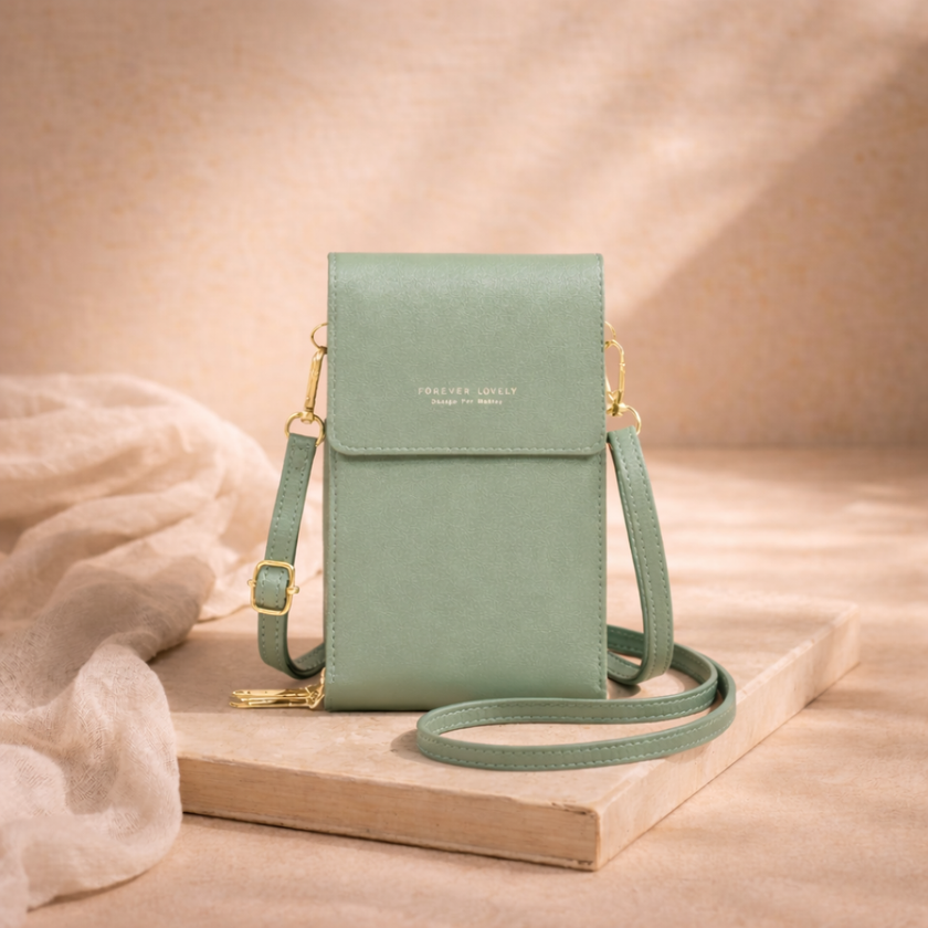 FJØRNA touchscreen crossbody phone bag for women, featuring a sleek design and transparent phone compartment for easy access.