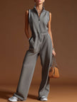 Dark grey FJØRNA women's cotton blend sleeveless jumpsuit with zip-up front and pants style, casual and comfortable fit.