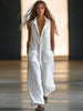 White linen sleeveless wide-leg jumpsuit for women, stylish FJØRNA pants with relaxed fit and elegant design.
