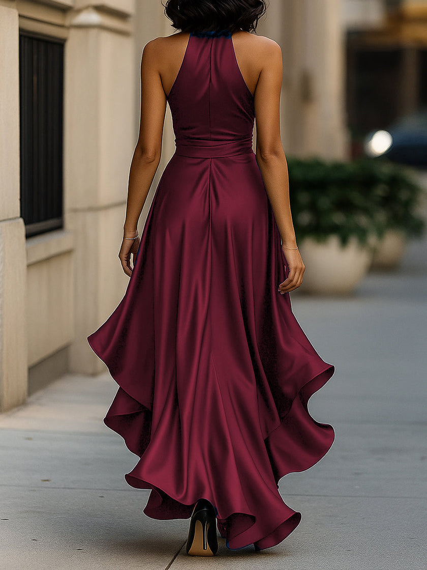 FJØRNA navy satin halter gown with ruffle details, elegant black tie dress for formal events.