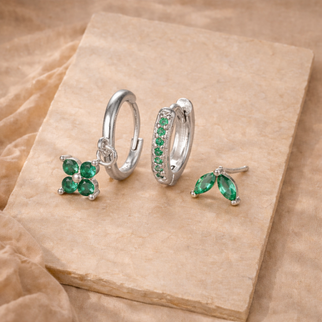 Unisex minimalist piercing set by FJØRNA featuring stainless steel hoops and stud earrings for women.