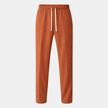Men's FJØRNA wide-leg drawstring joggers in relaxed casual style, showing the comfortable fit and neutral color.