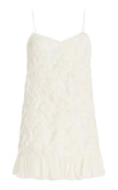 FJØRNA Blanc Rosette georgette mini dress in white, elegant wedding guest dress with delicate rosette details and flowy fabric.