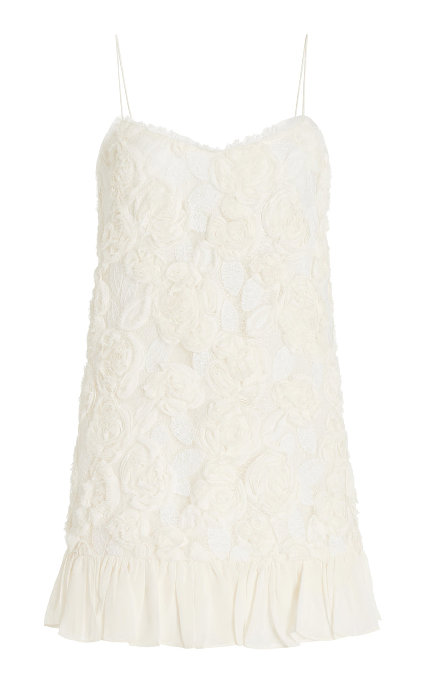 FJØRNA Blanc Rosette georgette mini dress in white, elegant wedding guest dress with delicate rosette details and flowy fabric.