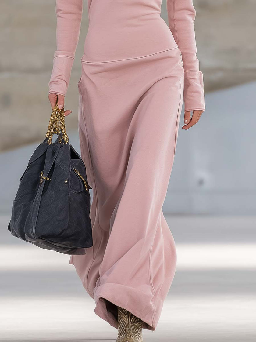 Pink V-neck maxi dress by FJØRNA, elegant evening dress with flowing fabric and V-shaped neckline, perfect for formal occasions.