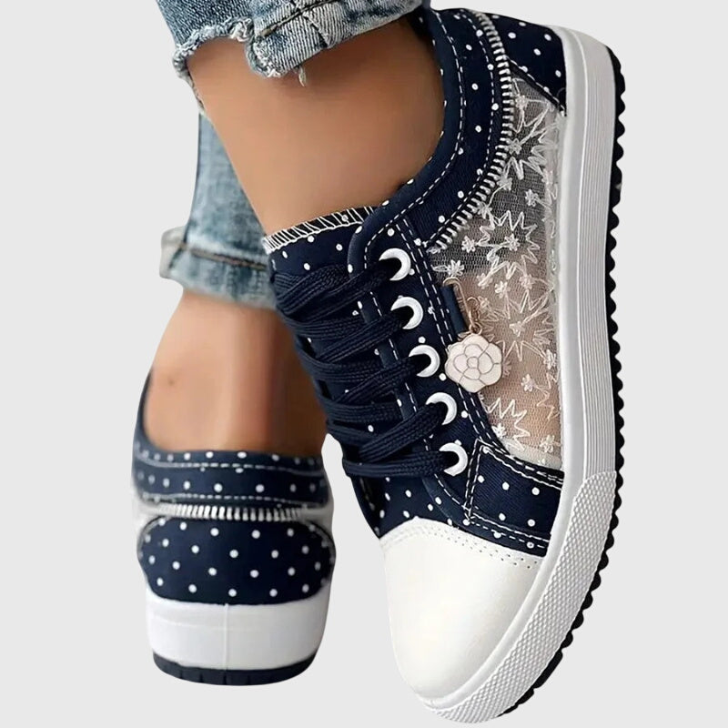 FJØRNA women's orthopedic sneakers with breathable mesh and cushioned insoles, designed for comfort and support.