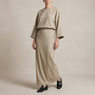Apricot women's summer two-piece co-ord set by FJØRNA, featuring a stylish wrap design and matching top and skirt.