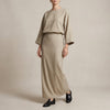 Apricot women's summer two-piece co-ord set by FJØRNA, featuring a stylish wrap design and matching top and skirt.